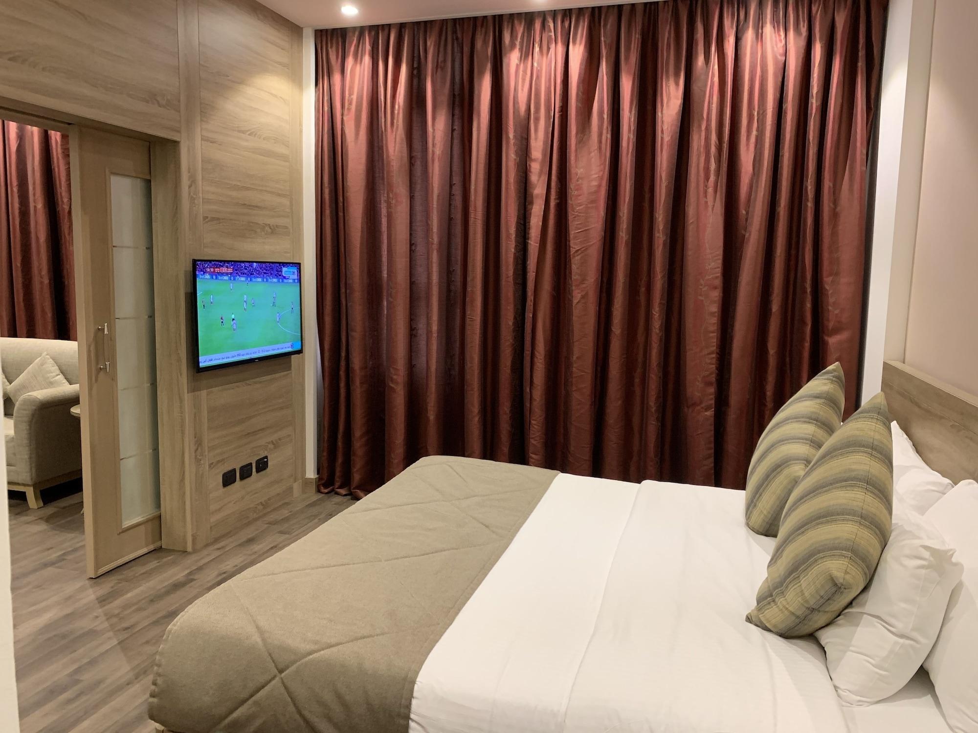 Carlton Al Moaibed Hotel Дамам Екстериор снимка A bedroom in the hotel