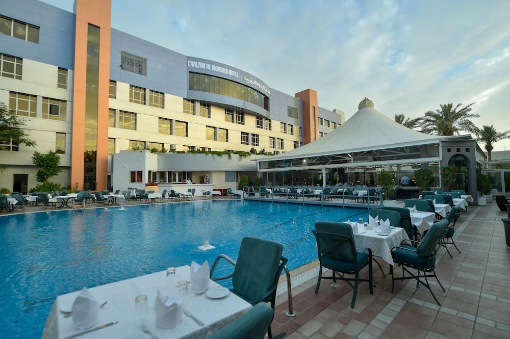 Carlton Al Moaibed Hotel Дамам Екстериор снимка The swimming pool at the hotel